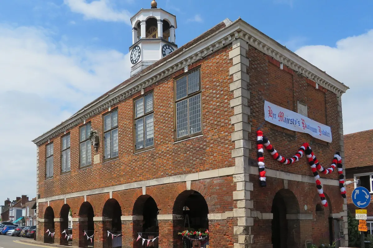The brick Market Hall with its clock turret on Old Amersham High Street